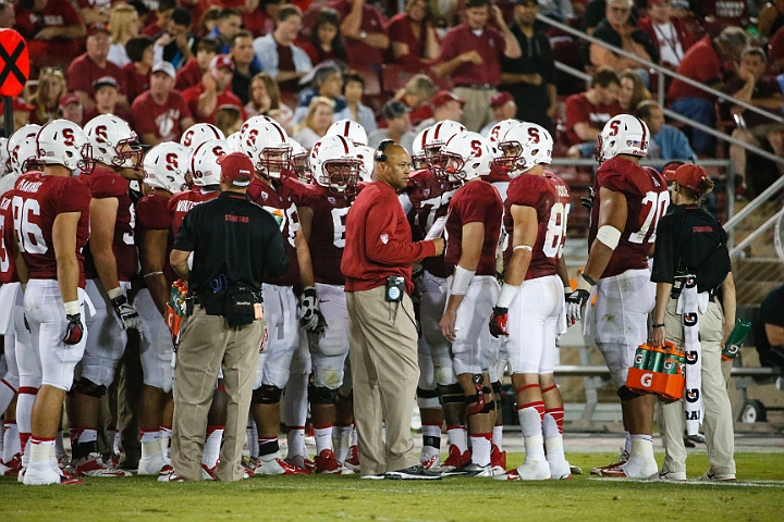 130907-Stanford-SanJose-016.JPG - Sept.7, 2013; Stanford, CA, USA; Stanford Cardinal head coach David Shaw (center) during a time out against the San Jose State Spartans at  Stanford Stadium. Stanford defeated San Jose State 34-13.